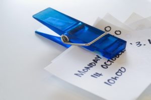 Image of a paperclip holding a to-do list for an article about how to write SEO content.