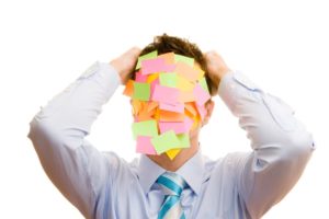 Image of a man with post-it notes on his face for an article about what SEO backlinks are and how to use them to drive traffic to your website.