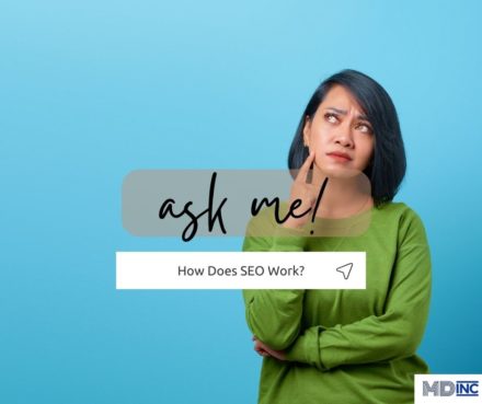 Image of a person in a green top with a blue background for an article about How Does SEO Work?